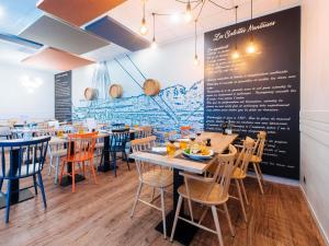 En restaurant eller et andet spisested på ibis Styles Ancenis Centre
