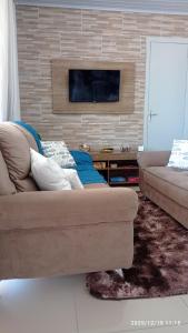 Et tv og/eller underholdning på Casa da Praia Capão da Canoa + 13 billeder