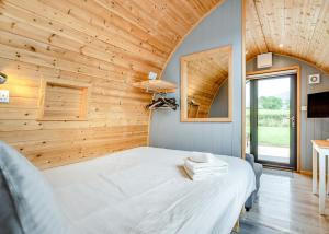 En eller flere senge i et værelse på South View Retreat + 35 billeder