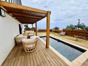 Swimmingpoolen hos eller tæt på L'Etoile Bleu T2 Grand Anse + 11 billeder