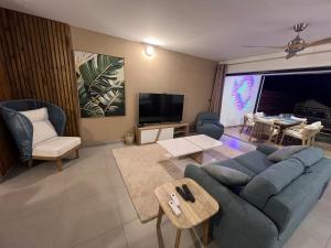 Et tv og/eller underholdning på L'Etoile Bleu T2 Grand Anse