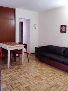 Khu vực ghế ngồi tại Lapacho Departamento Centrico +2 ảnh