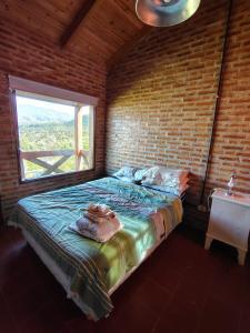 En eller flere senge i et værelse på Los Nietos