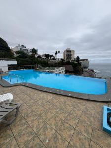 Bazén v ubytování Family apartment with ocean view - luxury location nebo v jeho okolí