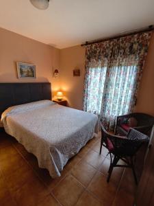 En eller flere senge i et værelse på Hostal Sol de la Vega + 38 billeder