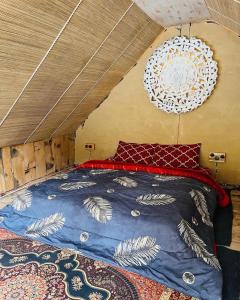 Ένα ή περισσότερα κρεβάτια σε δωμάτιο στο Mudhouse Shangarh