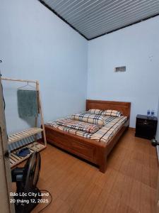 En eller flere senge i et værelse på Lương Y Trần Thúy Liên