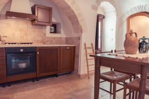 Kuchyň nebo kuchyňský kout v ubytování Resort La Corte Dell'Astore - Wild in Style Resort