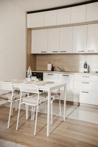 Kuchyň nebo kuchyňský kout v ubytování Apartmány park