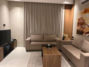 Et opholdsområde på هيلز للشقق المخدومة