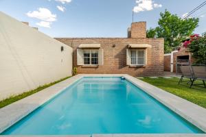 Swimmingpoolen hos eller tæt på Familia y Amigos con Pileta, Asador y Cochera