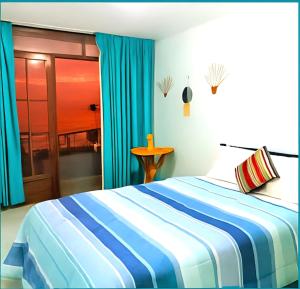 En eller flere senge i et værelse på La Estancia