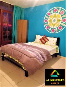 En eller flere senge i et værelse på La Estancia