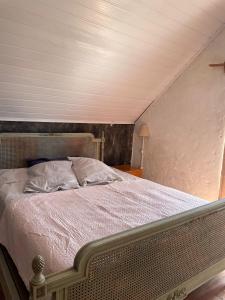 En eller flere senge i et værelse på Casa Punta Del Diablo