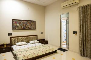 En eller flere senge i et værelse på Sukoon The घरर + 54 billeder