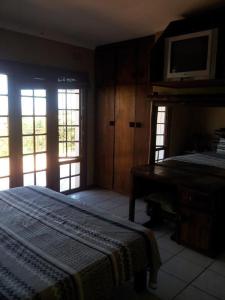 En eller flere senge i et værelse på Ballito Vaca Home - KZN SA