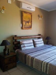 En eller flere senge i et værelse på Ballito Vaca Home - KZN SA