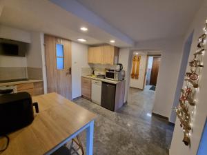 Kuchyň nebo kuchyňský kout v ubytování Sielanka Pod Siglanami 1