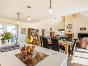 Posezení v ubytování Lizzie's Cottage