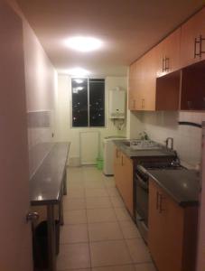 Køkken eller tekøkken på Departamento Amoblado