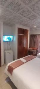 Et tv og/eller underholdning på Lifegate Guesthouse