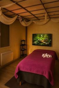 Postel nebo postele na pokoji v ubytování Nuit privilège & spa