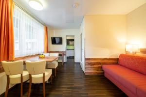 Et tv og/eller underholdning på Apartment - Camping Brunner am See