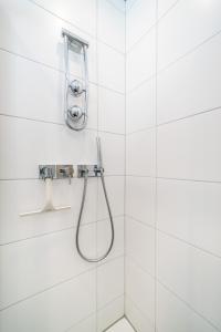 Et badeværelse på Apartment - Camping Brunner am See