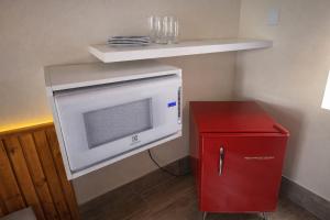 Nhà bếp/bếp nhỏ tại Pousada Charmosa Lua Nova Pipa