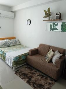 Postel nebo postele na pokoji v ubytování Pamz View Studio Condominium Unit + 5 fotografií