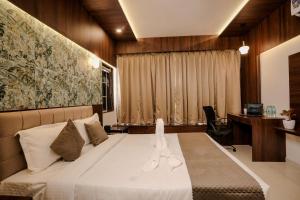 Ένα ή περισσότερα κρεβάτια σε δωμάτιο στο High Five Hotels +27 φωτογραφίες