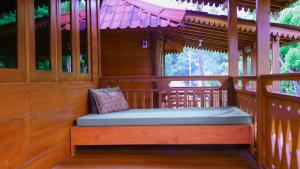 En eller flere senge i et værelse på Gihon Bungalow + 36 billeder