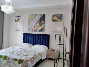 Postel nebo postele na pokoji v ubytování Camera a 2 minuti dal mare e la mosquee Hassan 2