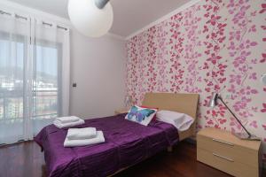 Llit o llits en una habitació de Design Gardens Nº2