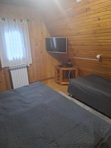 TV a/nebo společenská místnost v ubytování Vikendica Vedran Jahorina