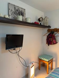 Et tv og/eller underholdning på VILLA GESELL Sur