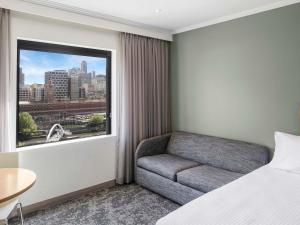 Гостиная зона в Mercure Melbourne Southbank +90 фотографий