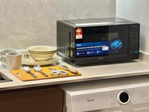 Køkken eller tekøkken på 2min walk to TRX,KLCC view Gaming 2pax swimming pool