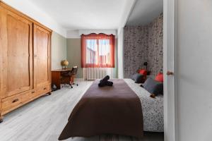 Postel nebo postele na pokoji v ubytování Maison Louis - Maison 3 chambres sur 2 niveaux, cœur de ville + 30 fotografií