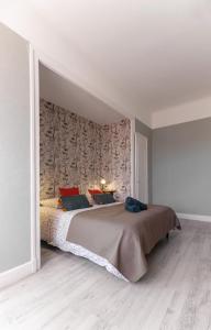 Postel nebo postele na pokoji v ubytování Maison Louis - Maison 3 chambres sur 2 niveaux, cœur de ville