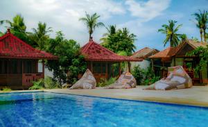Swimmingpoolen hos eller tæt på Welly Bungalow