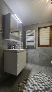 Koupelna v ubytování Apartamenty Rodzinne + 31 fotografií