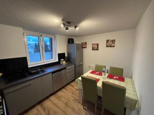 Køkken eller tekøkken på Ferienwohnung AyNa 3, direkt an der Schweizer Grenze