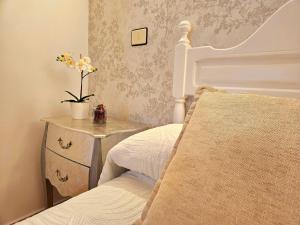 En eller flere senge i et værelse på Apartamento Costero con Piscina en Telde + 12 billeder