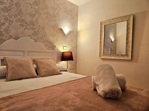 En eller flere senge i et værelse på Apartamento Costero con Piscina en Telde