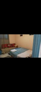 En eller flere senge i et værelse på Fekry House wady rayan + 10 billeder