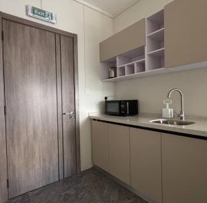 Køkken eller tekøkken på The Bay Apartment