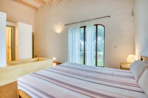 Ένα ή περισσότερα κρεβάτια σε δωμάτιο στο Duna