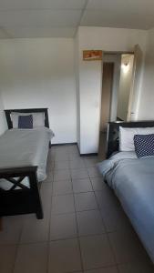 Postel nebo postele na pokoji v ubytování Esquina Sur