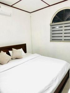 En eller flere senge i et værelse på Seliya Villa Retreat + 25 billeder